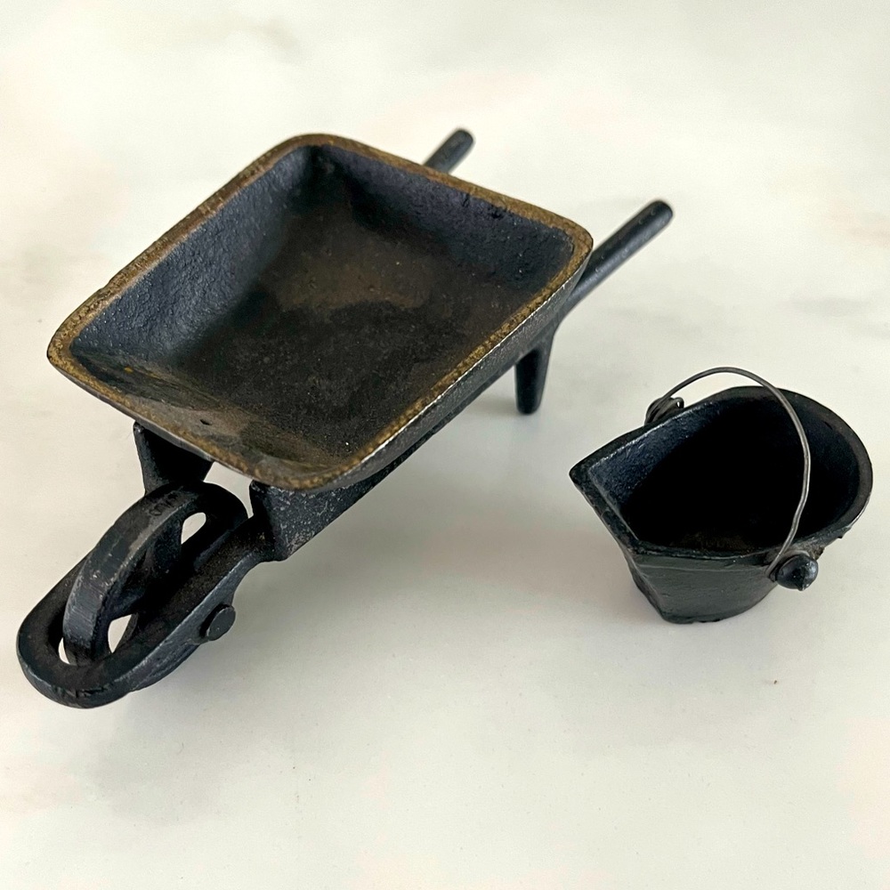 Vintage cast iron wheel barrel & bucket set